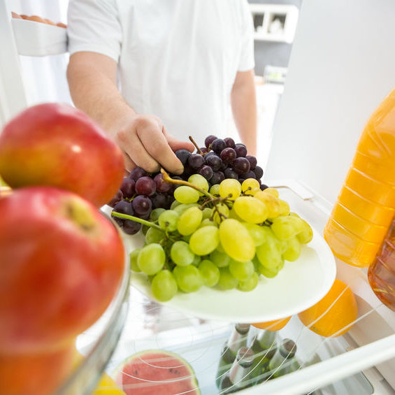 Grapes and apples in refrigerator ideal for diet
